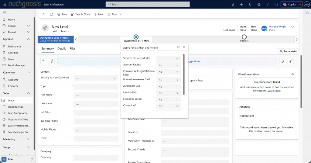 Microsoft Dynamics 365 Lead record showing an Enterprise Lead Process at the Awareness stage, with qualification fields including Awareness Call, Identify Pain, Economic Buyer, and Champion
